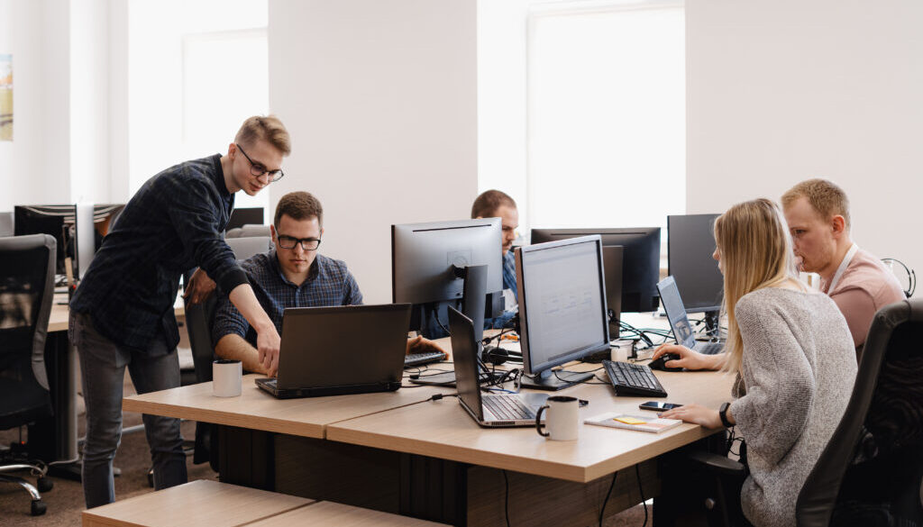 Group of young business people working in the office