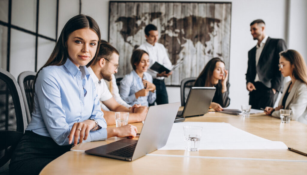 Group of people working out business plan in an office